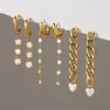 Pendientes de acero de titanio Wanxing europeos y americanos, sensación de lujo ligero y alta gama, clips para orejas de borla de circón para mujer, pendientes de acero inoxidable que no se decoloran al por mayor