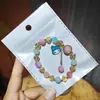 Libro Caperucita Roja Mismo Estilo Estudiante Pulsera de Glaseado de Palomitas de Maíz Hecha a Mano con Cuentas Dibujos Animados Cristal Pulsera Infantil Venta al por Mayor Cajas de Regalo