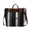 Shuai Mi Jia bolsa de mano de gran capacidad 2026 nuevo color de moda a rayas de bloques de color para el día a día bolso de hombro artístico estilo francés