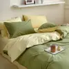 Juego de ropa de cama de algodón 100% de grado A para maternidad e infantil, juego de cuatro piezas de algodón puro con un diseño de dos tonos simple y de alta gama, que incluye funda de edredón, sábana plana y sábana bajera
