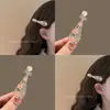Pinza para el cabello Pipa de flor antigua Temperamento femenino Flequillo Clip lateral Pinza para el cabello Rojo de internet Tocado Hanfu Moda Clip de pico de pato