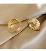 Brincos de Argola Torcidos Estilo Europeu e Americano, Luxo Leve, Nicho, Personalizados, Versáteis, Brincos da Moda Adequados para Rostos Quadrados e Redondos