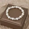 Pulseira Manta Pérola Rosa Feminina com Contas de Alto Padrão Nicho Novo Estilo Chinês Bola de Cristal Diamante Joia de Mão para Ano Novo Atacado
