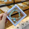 Libro Caperucita Roja Mismo Estilo Estudiante Pulsera de Glaseado de Palomitas de Maíz Hecha a Mano con Cuentas Dibujos Animados Cristal Pulsera Infantil Venta al por Mayor Cajas de Regalo