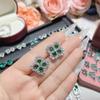 Pendientes de flor de camelia de lujo ligero, industria pesada, imitación esmeralda, chapados en oro, pendientes de mariposa de ágata verde, tesoro colorido, suministro en vivo