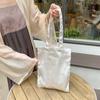 Bolso de hombro de satén perlado con textura de alta calidad, diseño de nicho, bolso de lona para mujer, bolso de mano de gran capacidad, novedad de 2024