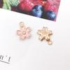 1 pendiente colgante de aleación de estilo coreano con forma de flor y llave de estrella de mar, color rosa