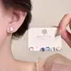 Pendientes minimalistas de ojo de gato con pasador de plata S999, Pendientes versátiles inspirados en la dopamina, Accesorios populares para las orejas, Regalo al por mayor para novia