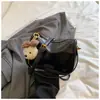 Bolso de mujer estilo coreano, simple y elegante, nuevo bolso de hombro casual de nicho 2026 con un toque de alta gama, bolso cuadrado pequeño versátil y moderno