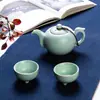 Juego de té de viaje en cerámica Ru del fabricante (una olla y dos tazas), Tetera de porcelana Ru, bolsa de viaje portátil, juego de regalo, logotipo de la empresa.