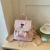 Nova mochila da moda estilo coreano com acabamento em renda para mulheres, com um toque descontraído, estilo ballet nicho, adequada para viagens e deslocamentos.