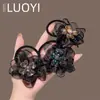 2025 Nuevo Estilo Coreano Lujo Ligero Diamante Brillante Flor de Cuatro Hojas Malla para el Cabello para Mujeres, Accesorio para el Cabello Simple de Moda y Versátil