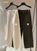 Sus nuevos jeans rectos de estilo coreano para principios de otoño, sencillos y elegantes, versátiles, adelgazantes, de cintura alta 66799