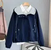 Chaqueta corta con capucha para mujer 2026 primavera y otoño nueva moda holgada casual chaqueta top abrigo casual versátil moderno