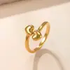 Anillo de acero inoxidable de venta caliente transfronterizo doble amor anillo abierto coreano simple titanio chapado en oro de 18k joyería fábrica mayorista