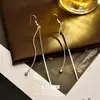 Brincos Gancho de Orelha com Borla Longa Linha de Agulha Prateada Estilo Coreano Design Geométrico Simples Versáteis Modernos Brincos para o Dia a Dia para Mulheres