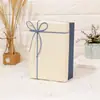 Caja de dulces con lazo spot de alta gama caja de regalo manual simple creativa tapa cielo y tierra caja de regalo rectangular festiva