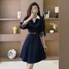 Vestido de otoño transfronterizo 2026 de manga larga con diseño de retazos, con cuello de camisa de dos piezas simulado, adecuado para usar en capas o como prenda exterior, falda de longitud media
