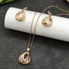Conjunto de pendientes y collar Xuping estilo vintage de nicho europeo y americano transfronterizo, conjunto de joyería elegante de aleación de cobre, venta al por mayor y hecho a medida