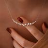 Colar de pérolas de rosto sorridente corrente de clavícula simples feminina banhada a ouro 18K cor proteção nicho design luz luxo vento frio corrente pescoço