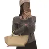 Suéter de punto de alta gama con flores tridimensionales y hombros descubiertos para mujer, tejido casual de otoño de manga larga con hombros descubiertos, hecho a medida transfronterizo