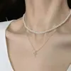 Nuevo Collar Cruzado de Diseño Francés 2026 para Mujer, Cadena para Clavícula con Colgante de Flor Pequeña Estilo Suave de Lujo Discreto