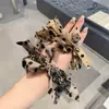 Laço de Cabelo Elástico de Leopardo de Alta Qualidade, Acessório de Cabelo Feminino - Coleção Primavera 2026
