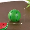 Nueva figura en miniatura de cerdo para decoraciones de bola de cristal DIY de escritorio, con un lindo cerdito comiendo sandía hecho de resina