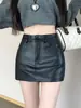 Pantalones de cuero PU falda corta para mujer otoño e invierno 2023 nuevos negros línea A falda tubo pantalones cintura alta adelgazantes pantalones de bota