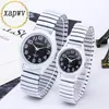 Charon Xapwv Novo Relógio de Casal com Pulseira de Aço e Óleo Branco e Preto Moda Masculina Relógio Feminino Atacado Fornecimento Direto da Fábrica