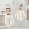 Otoño e invierno transfronterizo para bebé niña tejido a mano con bolas cuello redondo suéter pullover traje de punto hueco vintage para mujer mono