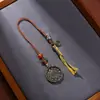 Colgante Redondo de Metal Retro Tibetano Amuletos Patrones del Zodiaco Grabados Borlas de Hilo de Colores Colgante para Llavero Tejido a Mano