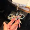 [Líder de Chica Linda] Cadena para Teléfono Móvil con Lazo de Perlas de Cristal Rosa Explosivo Colgante Exquisito para Bolso Estilo Nuevo