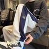 Calça de moletom Waffle amarrada no tornozelo masculina Primavera e Outono 2023 nova marca de moda calças esportivas soltas calças casuais versáteis americanas