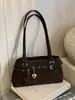Bolso de hombro cruzado de moda 2026 con diseño de nicho nuevo y moderno decorado con cinturón, bolso cruzado personalizado dulce y genial