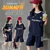 Conjunto de Verano para Niñas 2026 Nuevo Estilo Camiseta Rayada de Manga Corta Casual y Pantalones Cortos Ligeros Conjunto de Dos Piezas para Niños Mayores