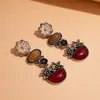 Pendientes Ovalados Vintage Europeos y Americanos con Incrustaciones de Diamantes y Flores, Pendientes Exagerados y Elegantes con un Toque de Lujo Ligero y de Alta Gama para Mujer