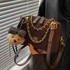Bolso acolchado de gamuza de alta gama para mujer, nuevo y moderno 2026, bolso de hombro y bandolera vintage de lujo ligero de nicho para verano