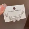 Exquisito y Moderno Set de Aretes de Tres Piezas con Lazo de Diamantes Completos y Perlas de Estilo Coreano con un Diseño Único y Sencillo