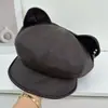Bonito sombrero de orejas de gato estilo japonés para mujer, nuevo sombrero octogonal versátil de verano 2026 que favorece la cara pequeña, sombrero de artista, boina
