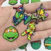Serie Tortugas Ninja Dibujos Animados Lindo Zapatos con Agujeros Zapatos Flor Hebilla para Zapatos PVC Pegamento Suave Venta al por Mayor Accesorios para Zapatos de Jardín Joyería