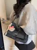 Bolsa Tote de Ombro Único Exclusiva Versátil Transfronteiriça Design de Nicho Moda de Trabalho Outono 2026 Bolsa de Ombro Alta