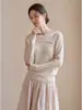 Suéter tejido de un solo hombro color albaricoque suave estilo francés para mujer, diseño de otoño, nicho, adelgazante, top básico de manga larga