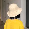 Sombrero de pescador con correa de color liso para niña, estilo coreano, con lazo, para primavera y verano, para mujer, sombrero de ala ancha que combina con todo.