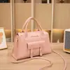 Bolsa de Mão Feminina Estilo Bolsa Kelly 2026 Moda Simples Bolsa de Ombro Bolsa Transversal Porta-Moedas Estoque de Fábrica Atacado