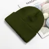 Venta al por mayor del fabricante Gorro cálido de moda para otoño e invierno, Gorro de punto a prueba de frío, Color sólido para exteriores, Protección para las orejas, Gorro de lana, Logotipo bordado