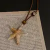 Collar con Colgante de Cuentas de Madera de Estrella de Mar 2026 Nuevo Estilo Ins Estilo Vacacional Elegante Cadena para Clavícula Retro Nicho Cadena para Suéter para Mujeres