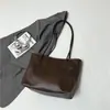 Bolso tote de moda estilo coreano para mujer, nueva colección 2026, gran capacidad, se puede llevar en la mano o colgar al hombro, con colores contrastantes y un diseño retro, adecuado para ir al trabajo