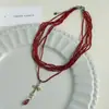 Collar Gargantilla de Flor Roja con Borla de Perlas Multicapa de Lujo Ligero y Exquisito Collar de Moda Cadena para Clavícula de Gama Alta
