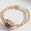 Europa y Estados Unidos superventas anillo de feldspato lunar de tiro cobre chapado en oro real de 14k diseño de envoltura a mano joyería para mujer